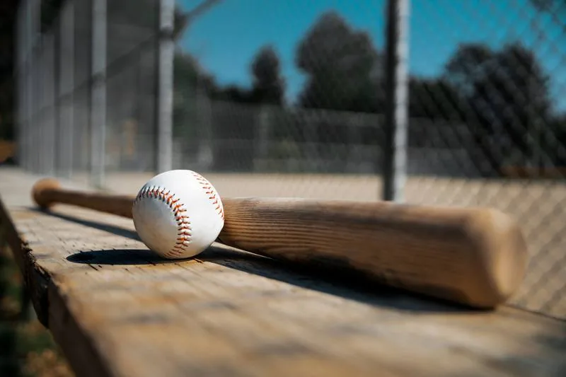 Baseball bat and ball